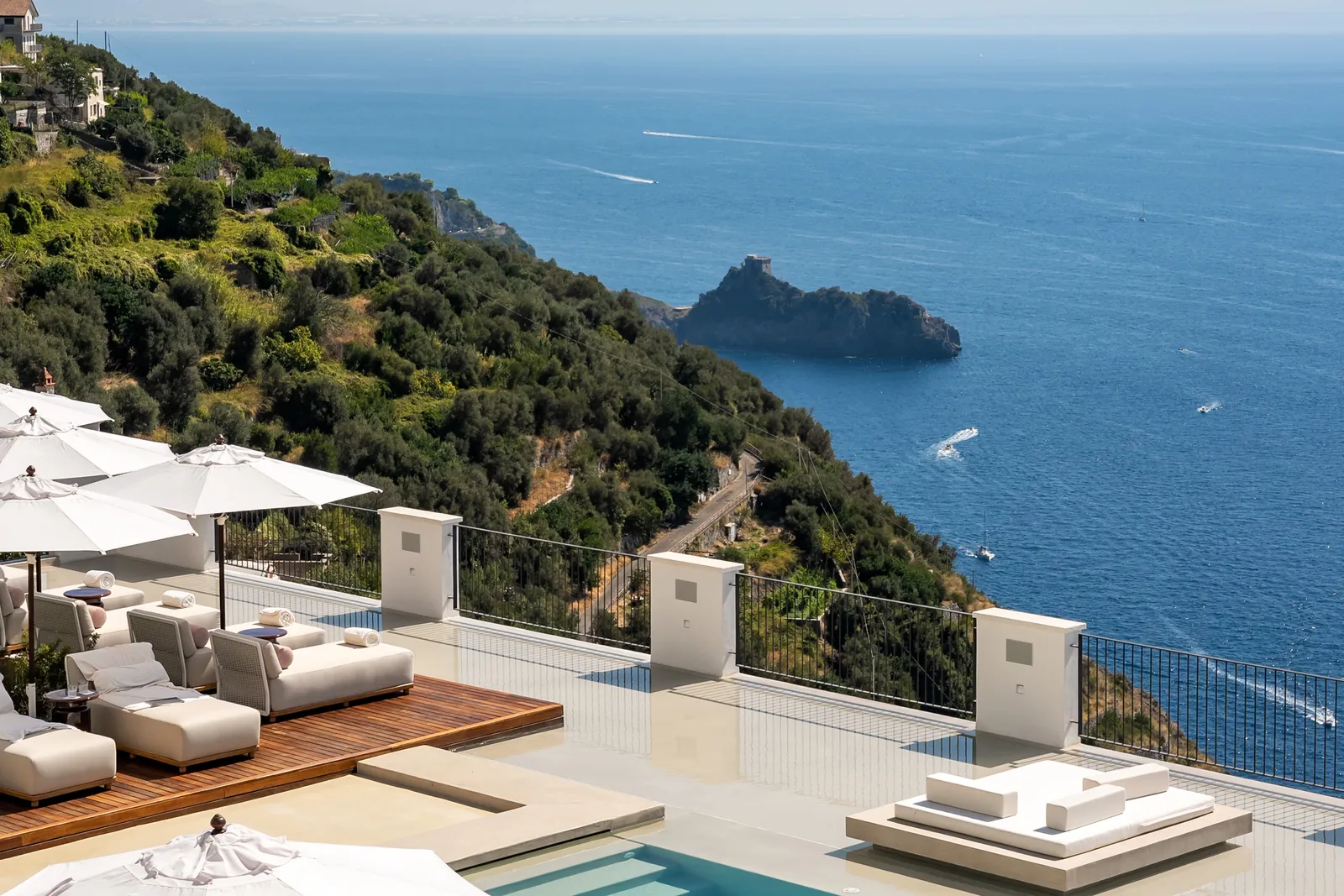 Pool terrace of Furore Grand Hotel high above the Amalfi Coast road and the sea